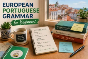 Study desk with beginner European Portuguese grammar notes, books and a Lisbon view in the background.